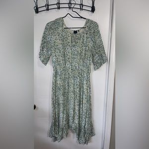 White, cream, and green Karri blue dress.